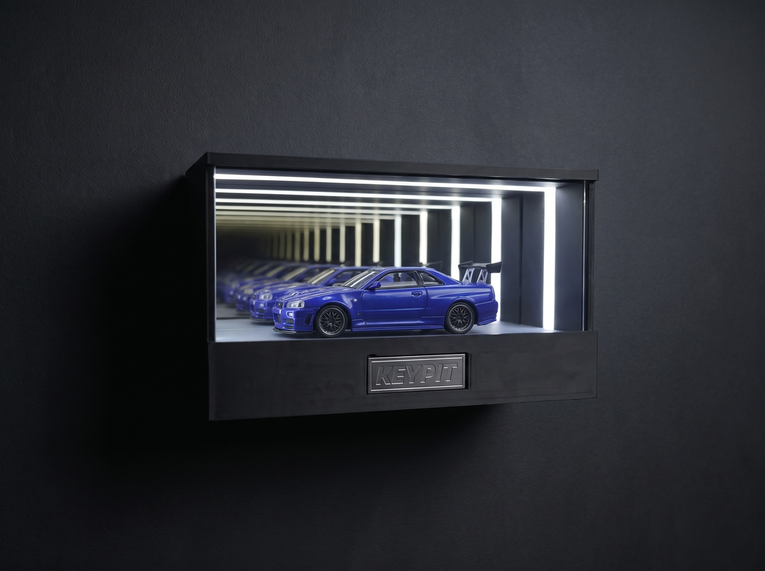 KP Design Infinity Garage infinity-mirror display case lighting a single 1:64 car into a tunnel of reflections
