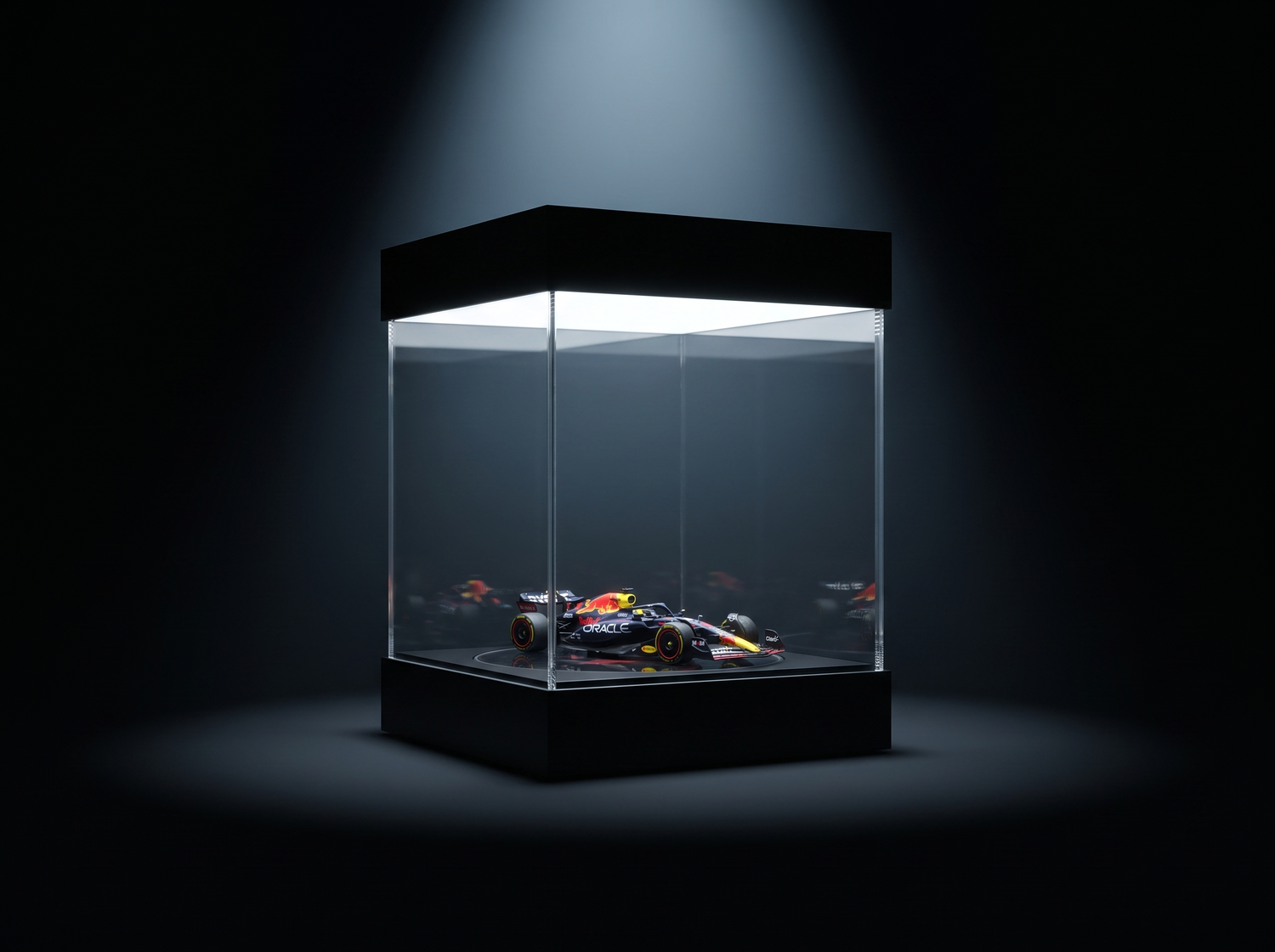 KP Design display case spotlighting a single grail 1:64 car under a beam of light