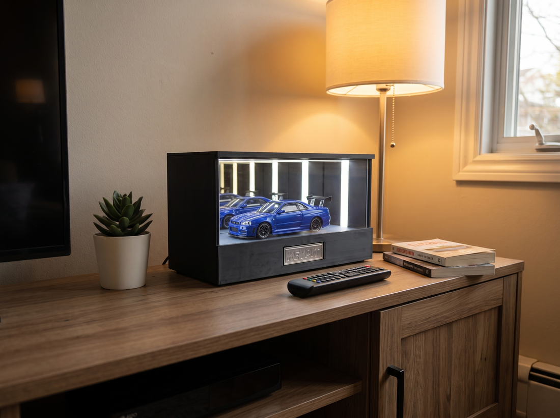 KP Design Infinity Garage LED display case lit on a living-room media console next to a TV, lamp and plant in a real home