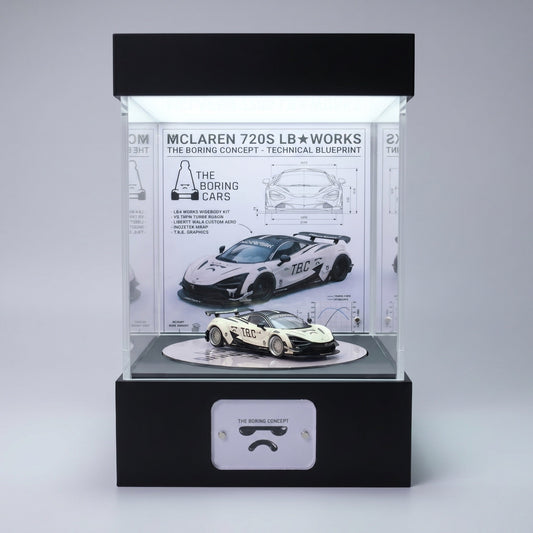 A white widebody McLaren 720S 1:64 in a lit KP Design Rotating Stage with a technical blueprint backdrop showing spec drawings and dimensions