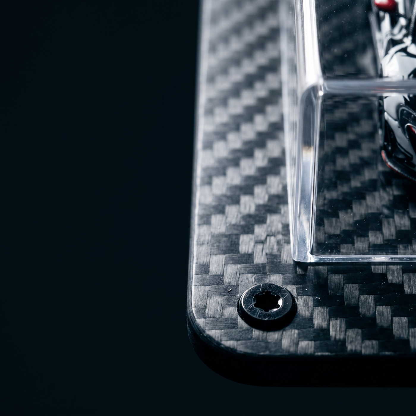 Raking light across the woven carbon plate